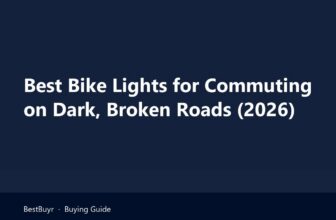 Best bike lights for commuting: a handlebar headlight lighting a pothole on a wet city street at dusk