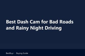 Best dash cam for bad roads mounted behind the mirror on a wet city road at night with a pothole ahead