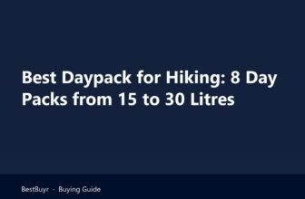 Best daypack for hiking on a rock at a ridge viewpoint with a group of day hikers on the trail behind