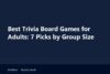 Best trivia board games for adults laid out on a coffee table during a game night with friends